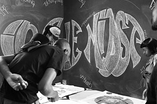 Black and white photo of a crowd viewing art