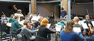 2014. gada septembris, Andromeda Mega Express Orchestra –Sinfonietta Riga Starptautiskais koncerts, uz skatuves satiekoties Rīgas un Berlīnes mūziķiem, uzsvēra Rīgas kā kultūras pilsētas ievērojamo reputāciju, un divu radošo mūsdienu mūzikas ansambļu kopīgais priekšnesums bija veltījums Rīgai kā Eiropas kultūras galavaspilsētai. 40 mūziķi koncertā 26. septembrī atskaņoja Berlīnes orķestra vadītāja un komponista Daniela Glacela jaunradītās kompozīcijas – izcils sniegums un neaizmirstams kultūras piedzīvojums!