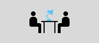 Graphic symbols depict two people sitting across from each other at a table.