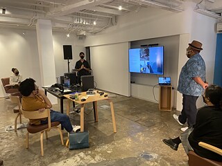 Panggung &copy; A sharing session presented by artist, Syafiq Halid (far left), and producer, Shaifulbahri Mohamad (right). Panggung