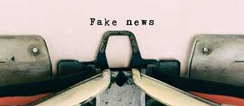 Schreibmaschine mit einem Papier, worauf "Fake News" steht