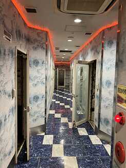 Hallway with booths in a karaoke house