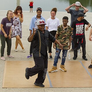 B-boy performing for onlookers in Washington DC