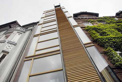 <b>Narrow energy-efficient house in Kiel</b><br/>The single-family home architect Björn Siemsen tucked into gap between two buildings in Kiel is extremely narrow: just 80 centimetres wide at the rear – not nearly enough room to swing the proverbial cat – though the front measures 4.5 meters and the interior offers a total floor space of 29 square metres. In 2007, Siemsen received an environmental award for his project built primarily of ecological materials and with wall radiant heating.