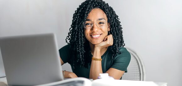 Female student in front of laptop