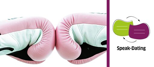 Deux gants de boxe roses et le logo de Speak-Dating (deux bulles de conversation)