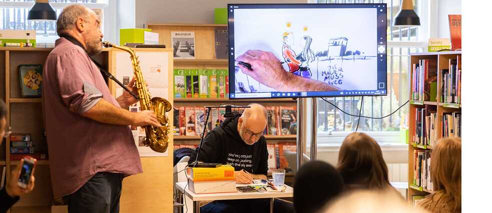 Festival on 28.10.23: Live drawing with German comic artist Reinhard Kleist; musically accompanied by Scottish saxophonist and composer Raymond MacDonald