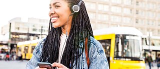 Smiling woman with headphones