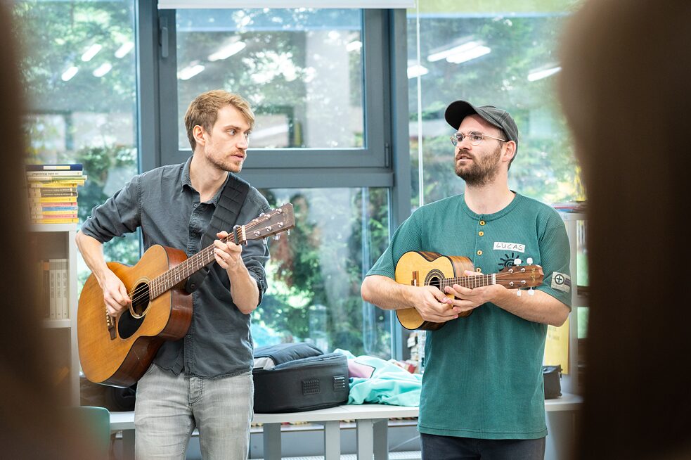 ok.danke.tschüss Marian und Lucas bei einem Workshop