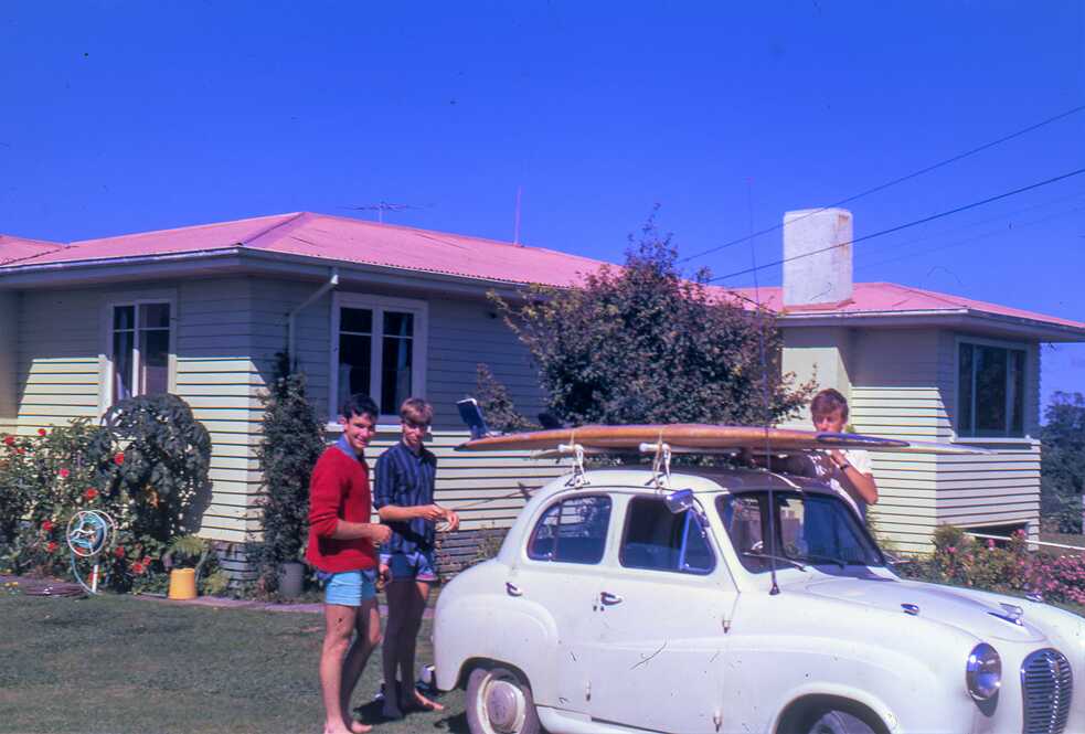 Dave Lowe in front of house as teenager
