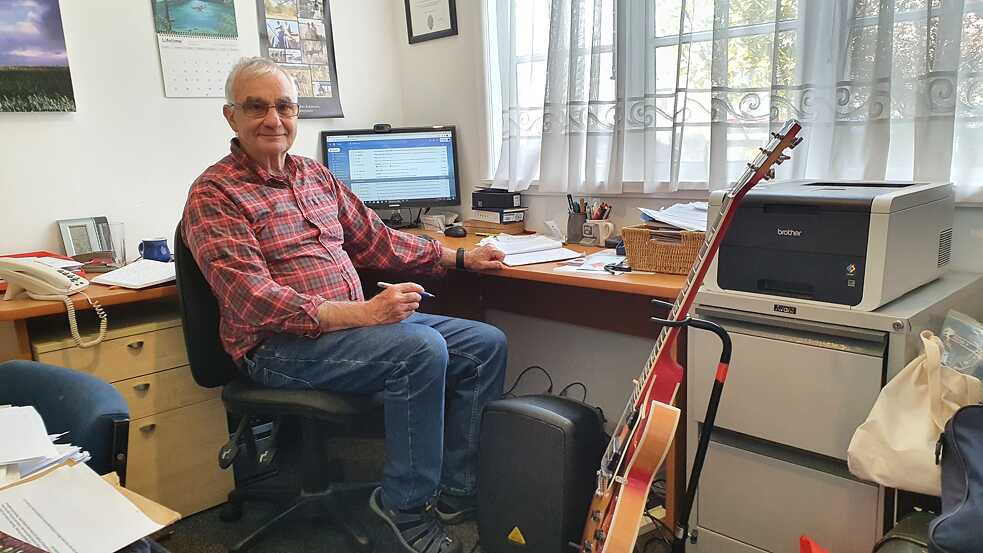 Dave Lowe works on his book