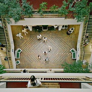 View from above into the central hall of a high-rise building