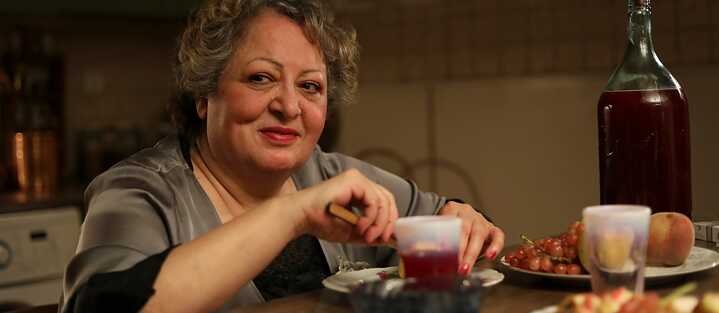 Lily Farhadpour as widow Mahin in the movie “Keyke mahboobe man” (eng. My favorite cake)