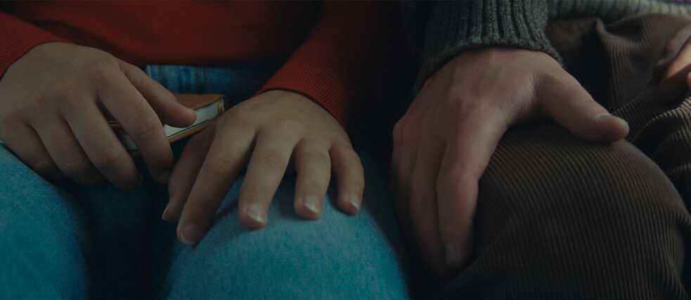 Aurélia Arandi-Longpré, Noah Parker (or, rather their hands) in "Who by Fire" by Philippe Lesagee
