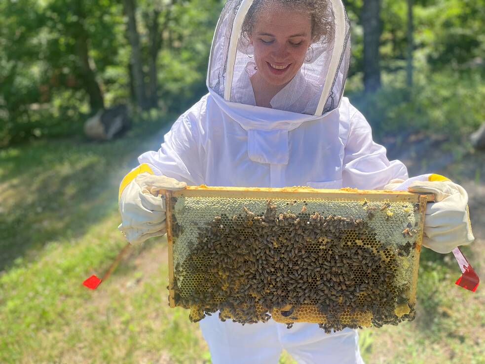 Erin Woodbrey with bees