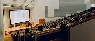 Students sitting in lecture hall 