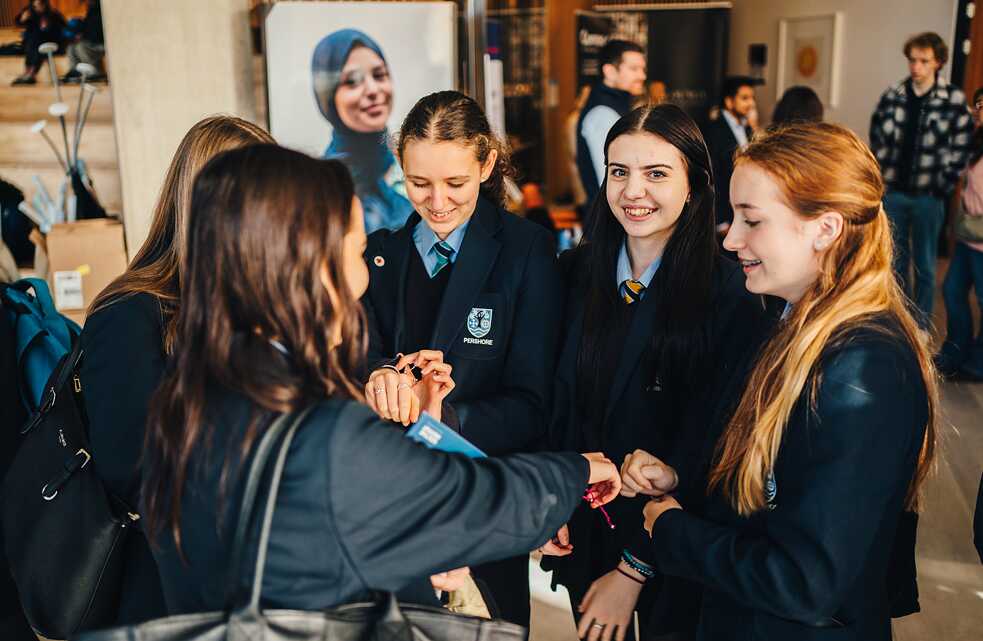 Group of female school students: Students exchanging ideas