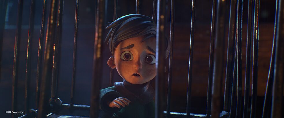 Ein kleiner Junge schaut ängstlich durch Gitterstäbe hindurch.