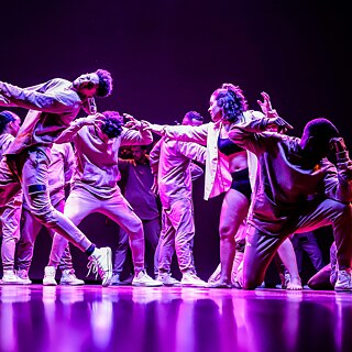 A group of dancers on stage
