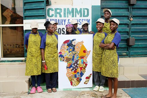 COD youth posing by art work