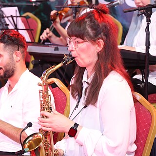 The saxophonist Theresia Phillip playing during Mosul Music Heritage Festival