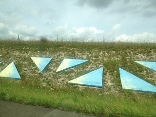 Cubes and cylinders by Guy de Rougemont on the French Autoroute A4 near the city of Reims