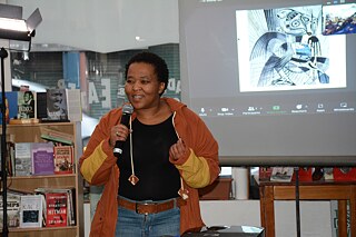 Curator Ukhona Mlandu opens the programme