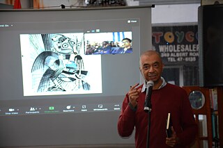 Dr Valmont Layne who curated the Sonic Power Toolbox session presents the speakers 