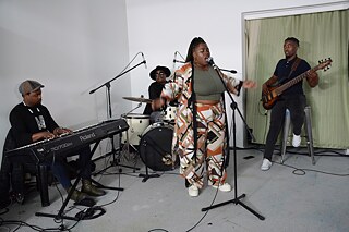 Tankiso Mambolo, Nomakrestu Xakatugaga, Sky Dladla and the band filled the space with music