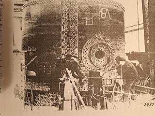 Ship’s cylinder boiler at the riveting press, in the centre the manhole through which the Kedelkloppers entered the boiler. Ottenser Eisenwerke, circa 1930