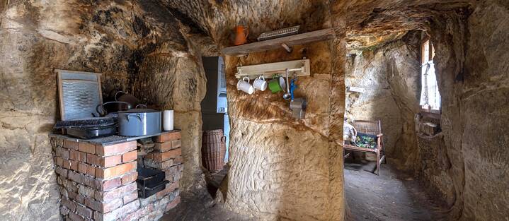 Five cave houses have been refurnished to show what life in them was like. Modest old-fashioned cupboards, crockery and beds can be seen, but the walls are bare rock, just as they always have been.
