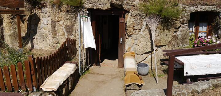 This is how it might have once looked in the small front gardens: an embroidered cloth on the table, washing hanging up in the sun to dry and a broom leaning against the wall by the front door.