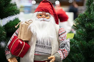 Father Christmas figure with Christmas presents