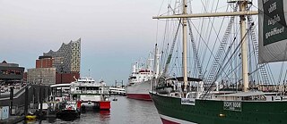 Hamburg harbor with the Elbphilharmonie concert hall and many ships