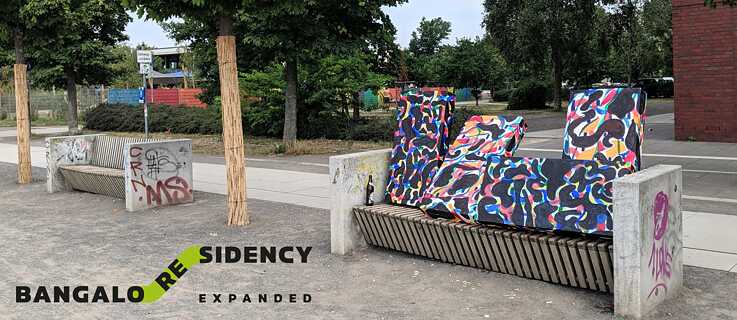 A colourful art work on a bench 