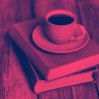 Books and a Coffee Cup