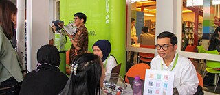 Arbeitsmigrationsteam bei Informationsveranstaltung