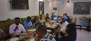 The Book Club Lagos members holding up My transition hours