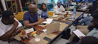 The Book Club Lagos members holding up My transition hours