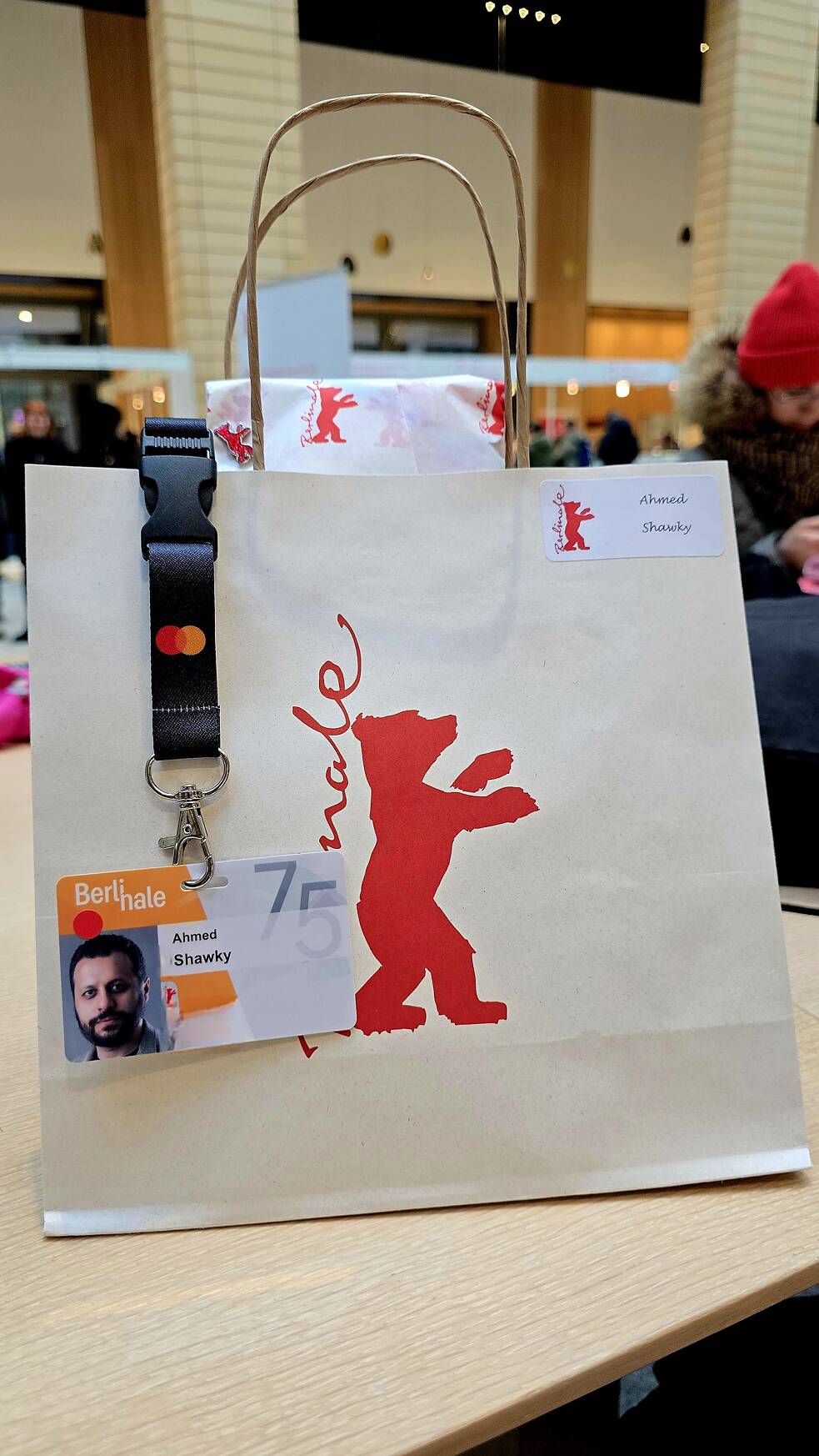 Jury orange badge with the press red dot.