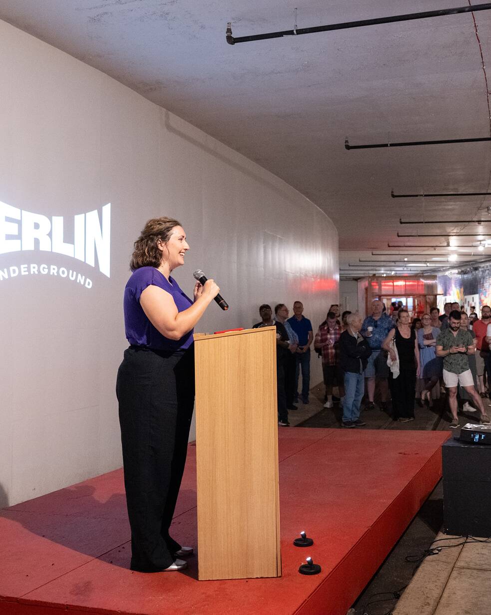 A female speaker at the Berlin Underground exhibition in Washington, DC