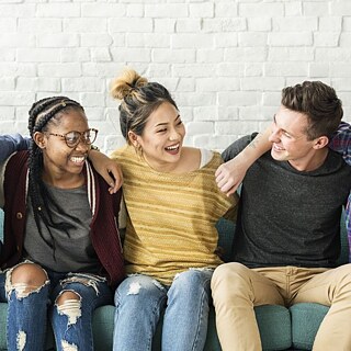 Young people sitting together