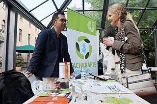 A man and a woman are talking