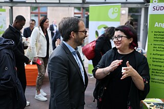 Two people are talking