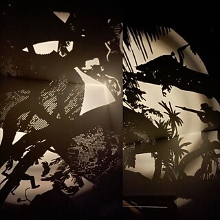 Projection of jungle motifs on fabric