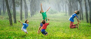 A group of boys playing outside