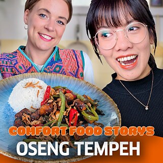 Image of two women holding a dish of oseng tempeh, with the text "Comfort Food Storys: Oseng Tempeh"