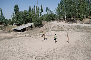 Children play volleyball in the village of Kök-Tash, Kyrgyzstan.