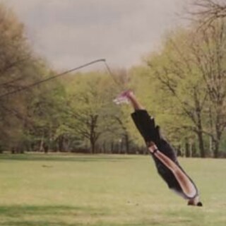 Abtract image of man on the end of a fishing rod