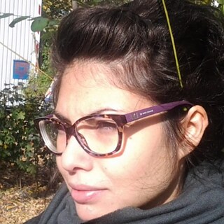 A photo of Marianna outside infront of tree